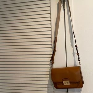 Used once maybe twice . Adjustable strap on both sides of straps. 9X6.5